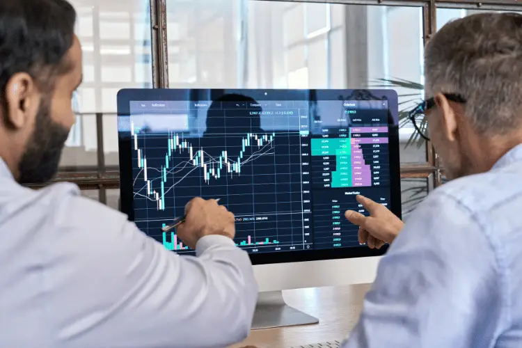 Two traders brokers stock exchange investors analyzing crypto trading charts